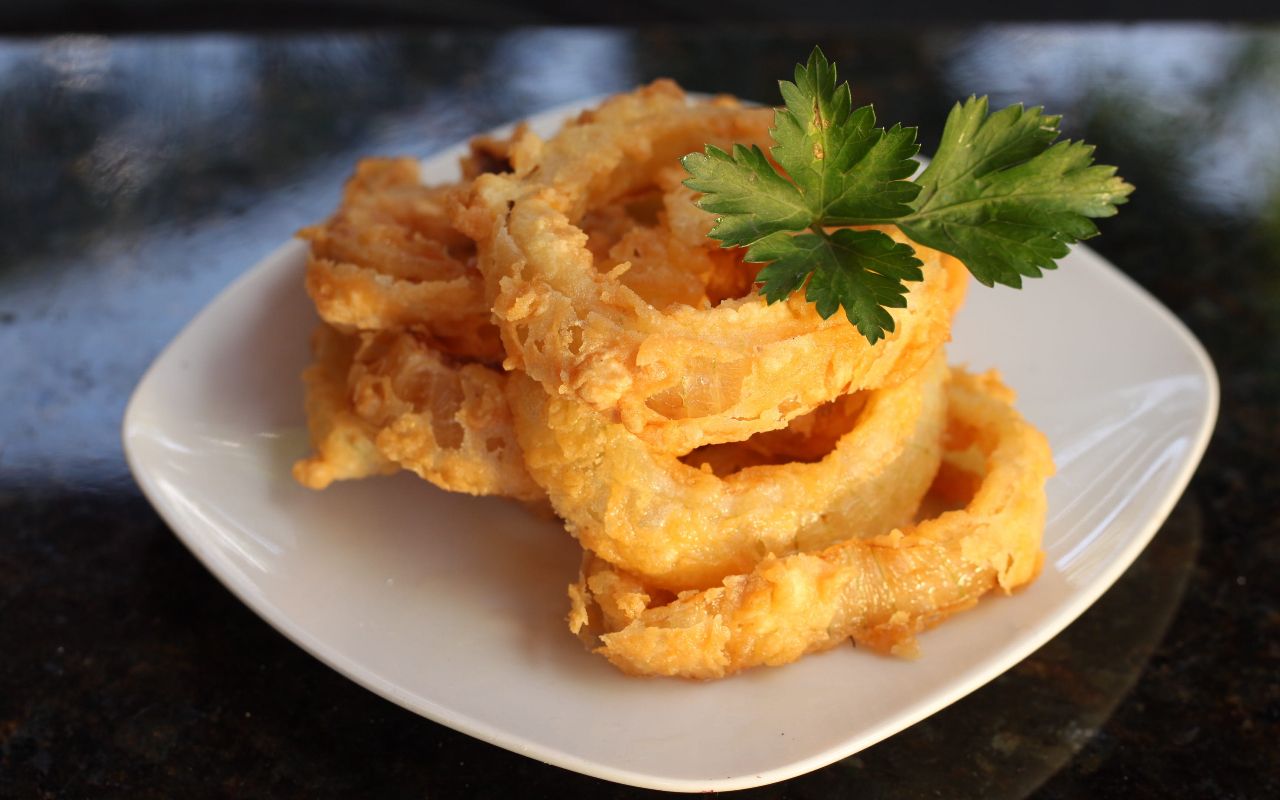 Les Onion Rings, les oignons frits avec l'accent américain - CNEWYORK
