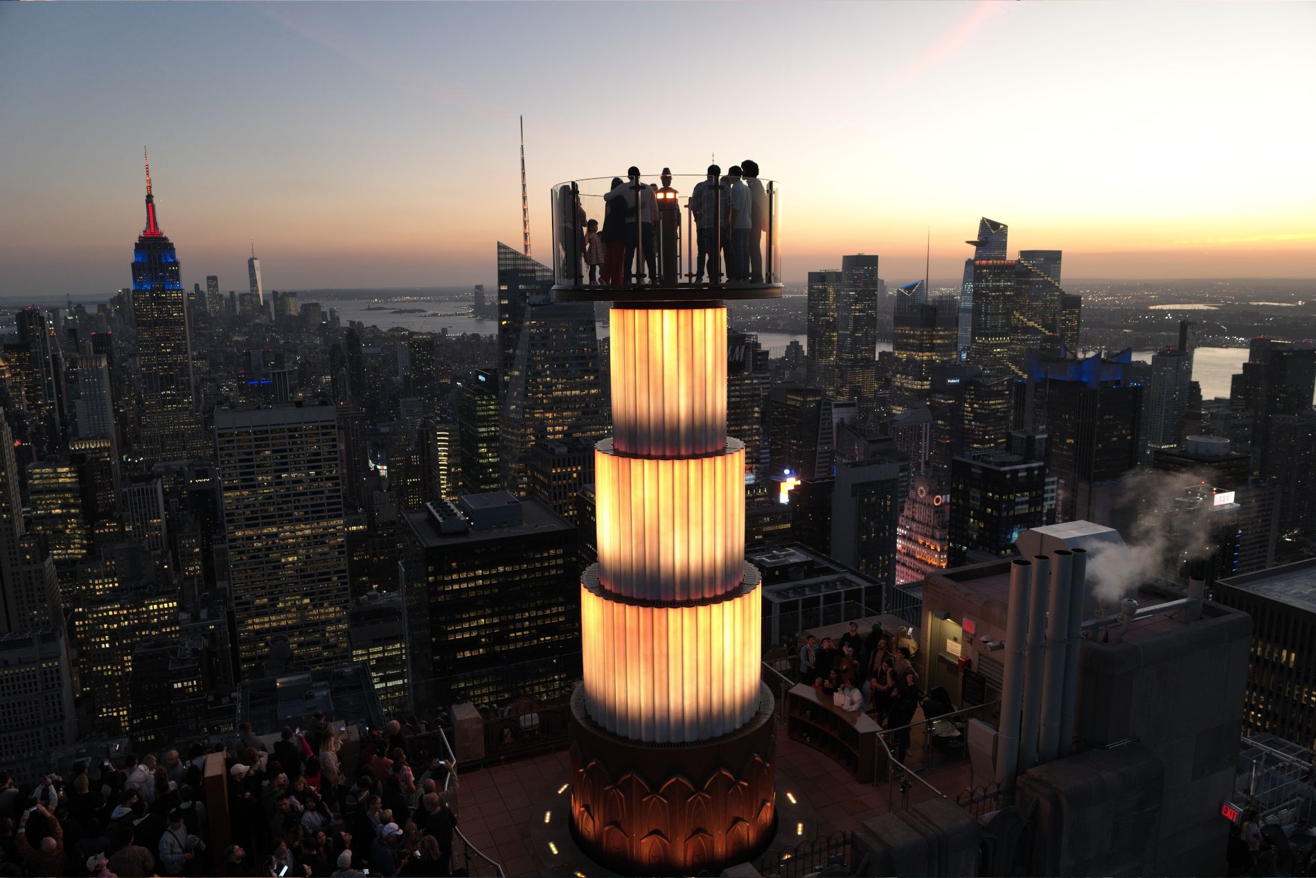 Coucher de soleil sur l'attraction Skylift au Top of the Rock à New York